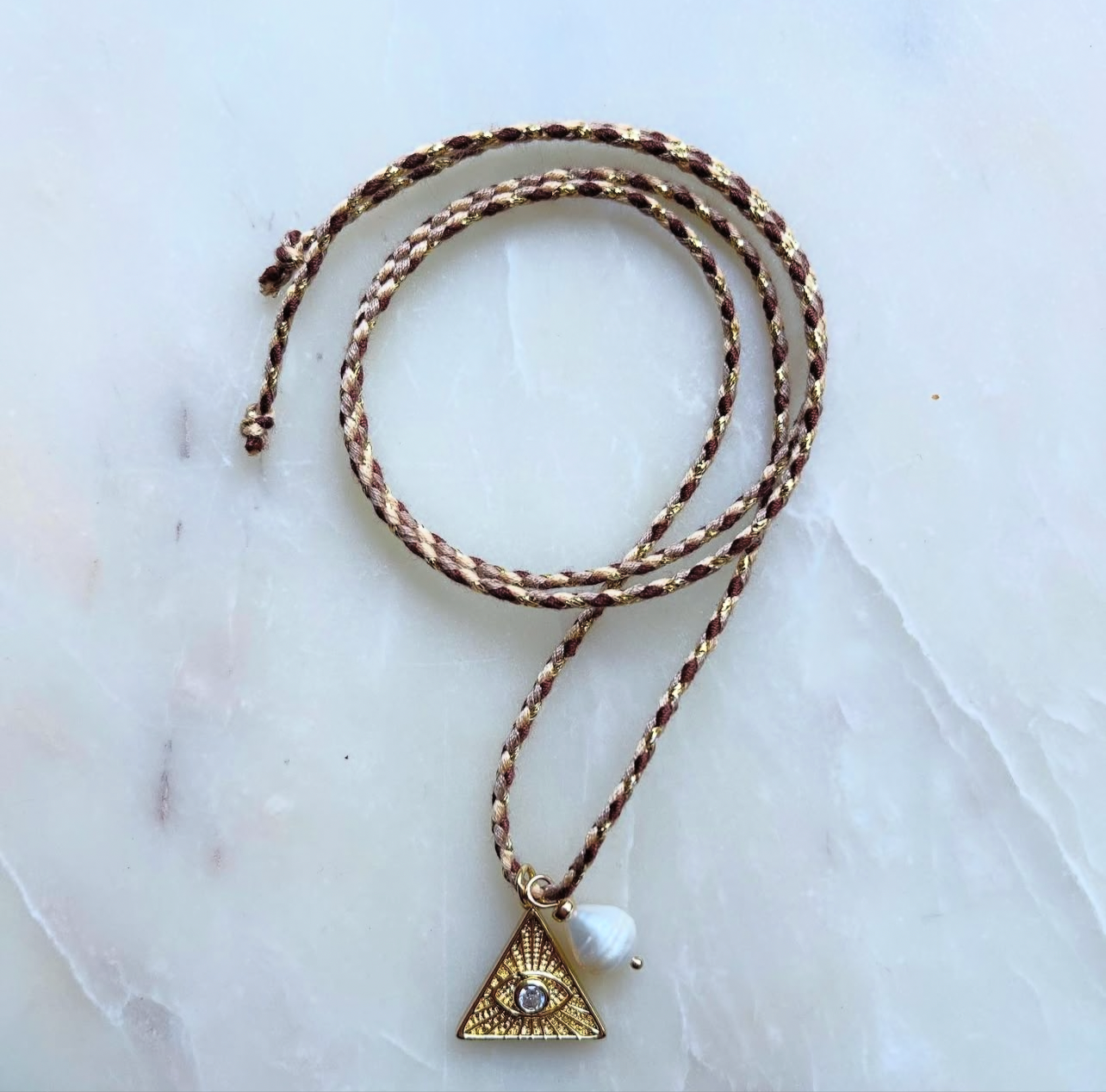 Gold charm Eye Tie on Necklace