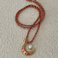 Coral crescent moon necklace tie on