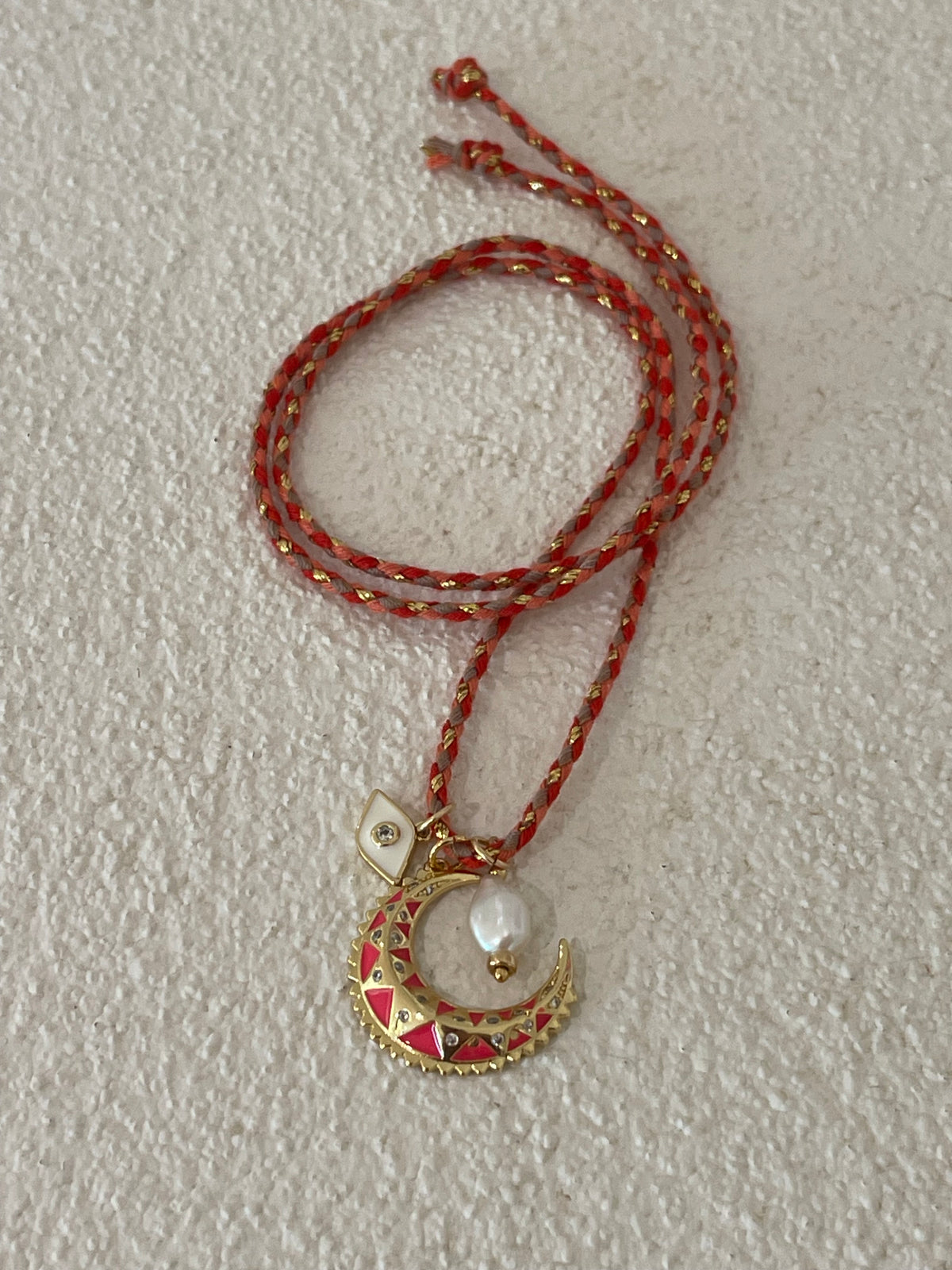Coral crescent moon necklace tie on