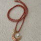 Coral crescent moon necklace tie on