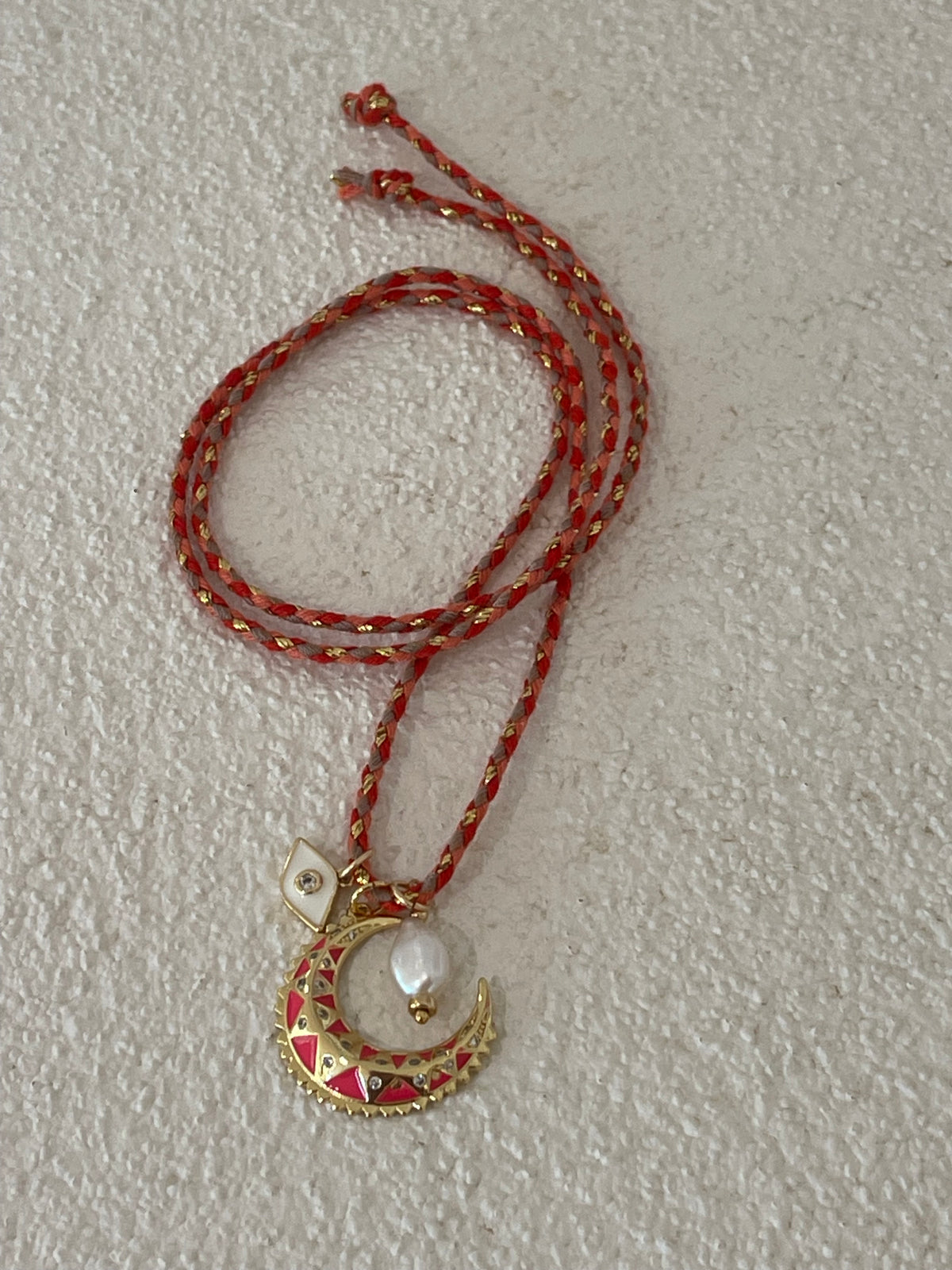 Coral crescent moon necklace tie on